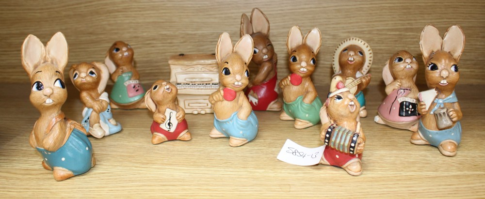 Eleven assorted Pendelfin rabbits and a piano